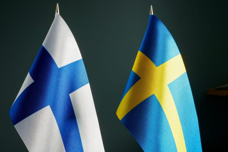 The Small Flags Of Sweden And Finland.