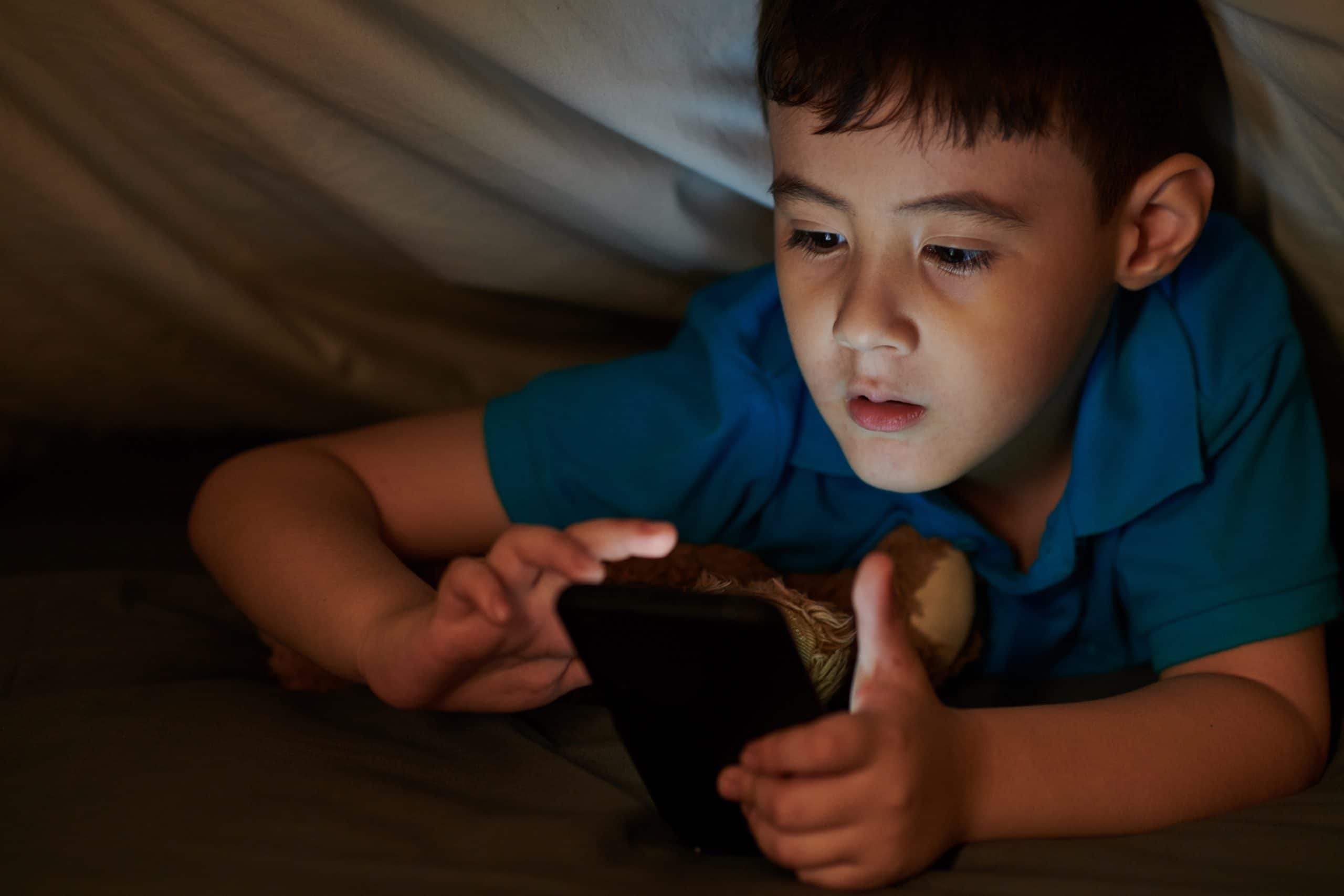 Child watches video on phone