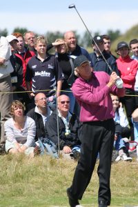 Greg Norman Golfing