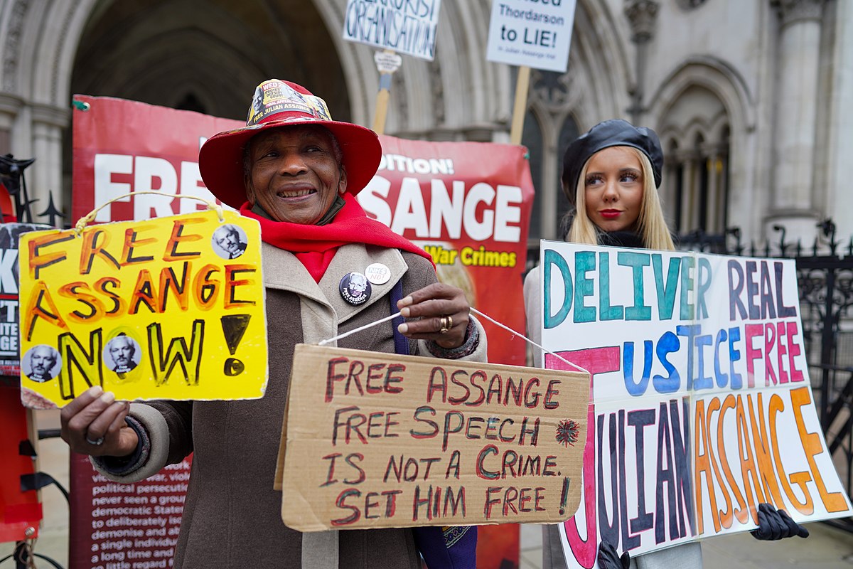 Civilians protesting for the freedom of Julian Assange