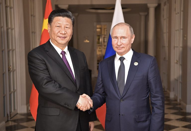 Vladimir Putin and Xi Jinping meet