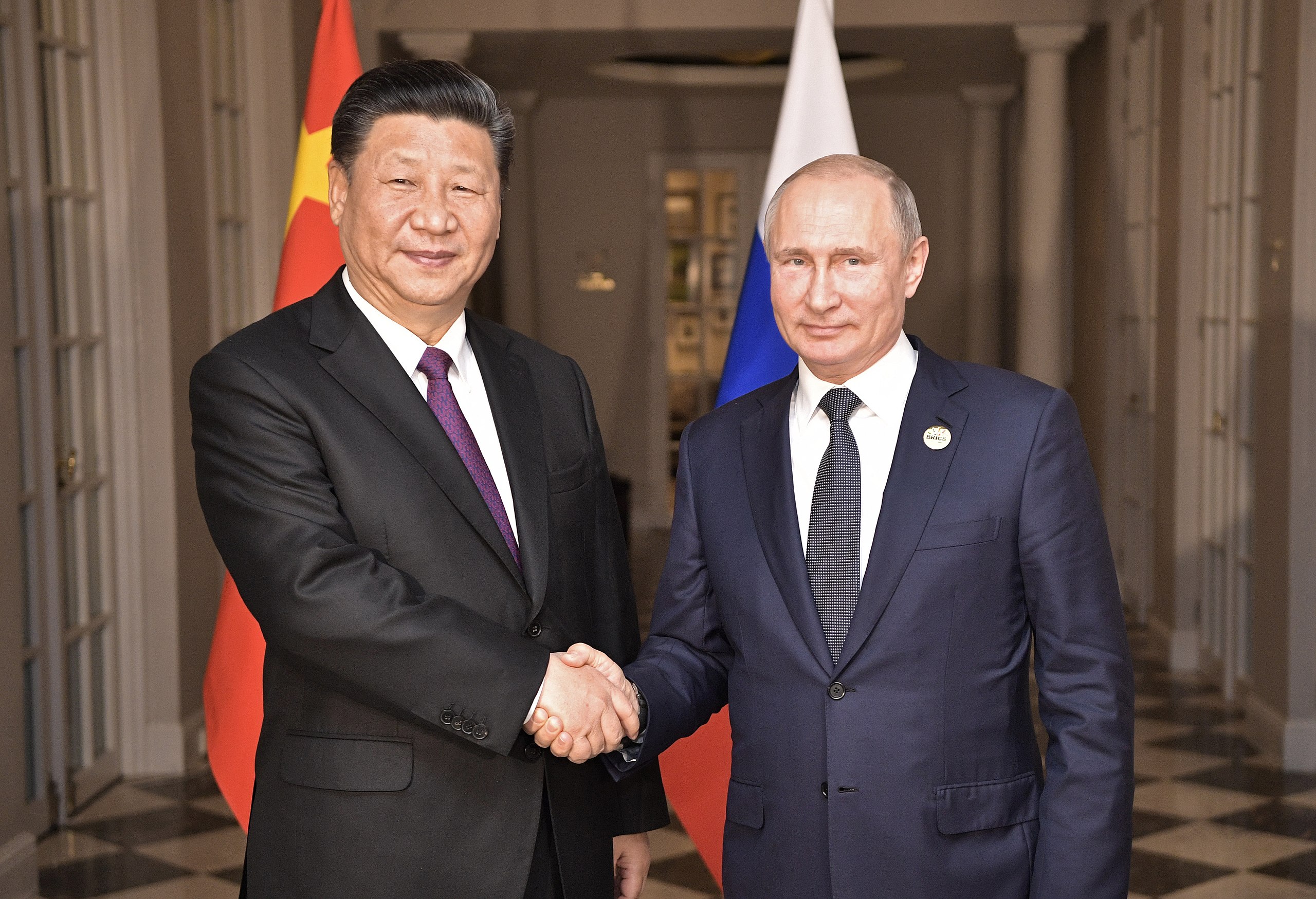 Vladimir Putin and Xi Jinping meet
