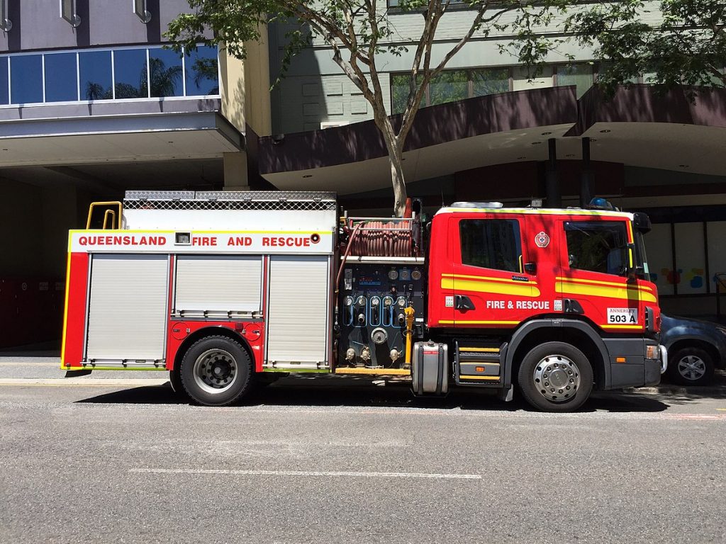 A Queensland firefighter has died after a factory fire South of Brisbane