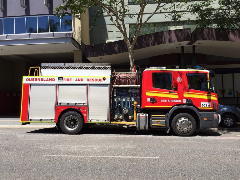 A Queensland firefighter has died after a factory fire South of Brisbane