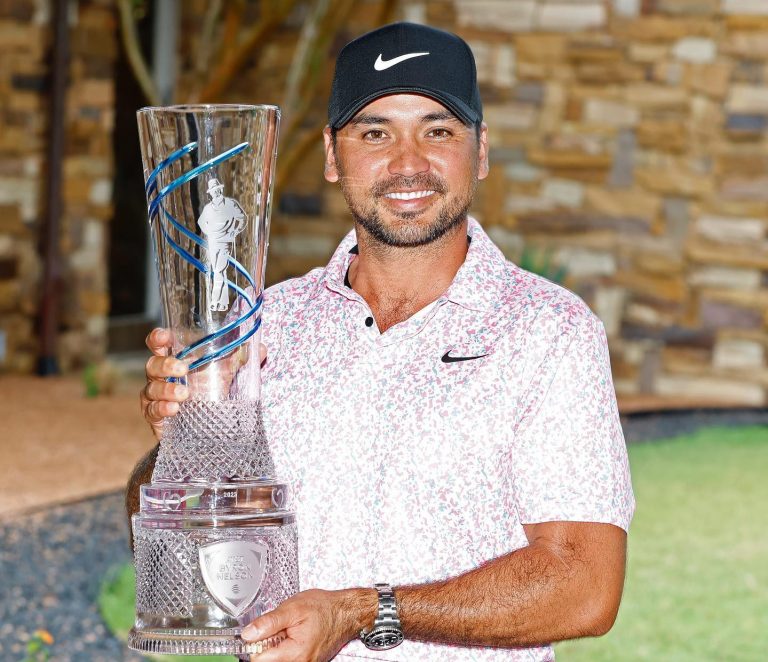 Jason Day holding his trophy after winning the Byron Nelson PGA Tour.