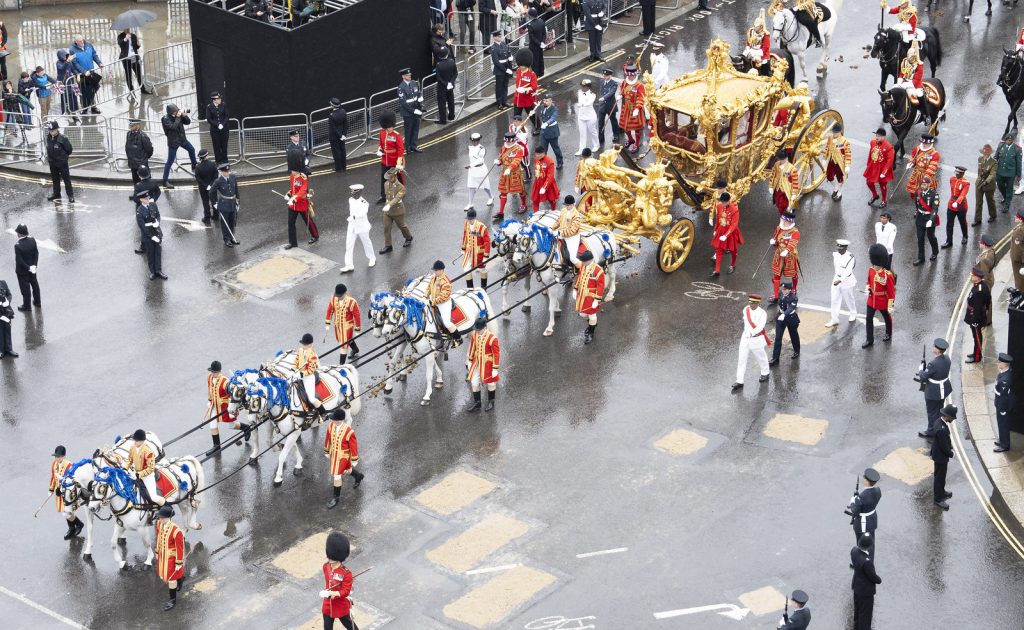 A horse drawn carriage as part of the procession for the coronation of King Charles III.