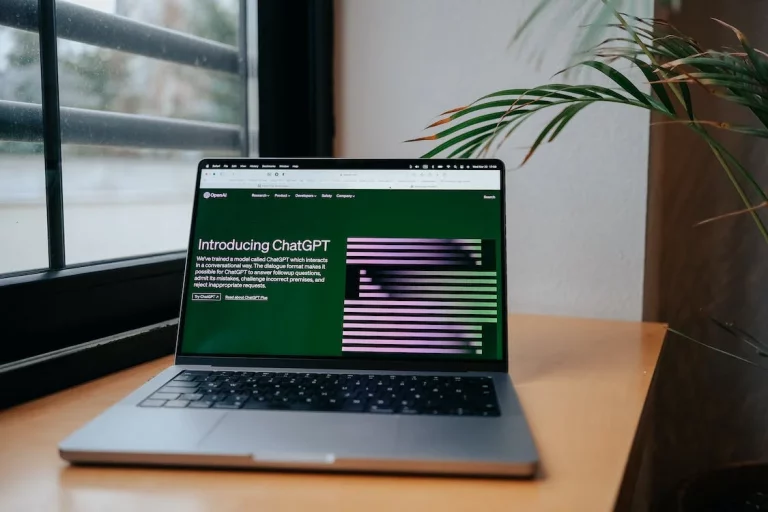 Open laptop displays ChatGPT