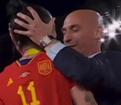 Luis Rubiales grabs Jenni Hermoso’s head and kisses her on the lips during the Women’s World Cup final presentation ceremony.