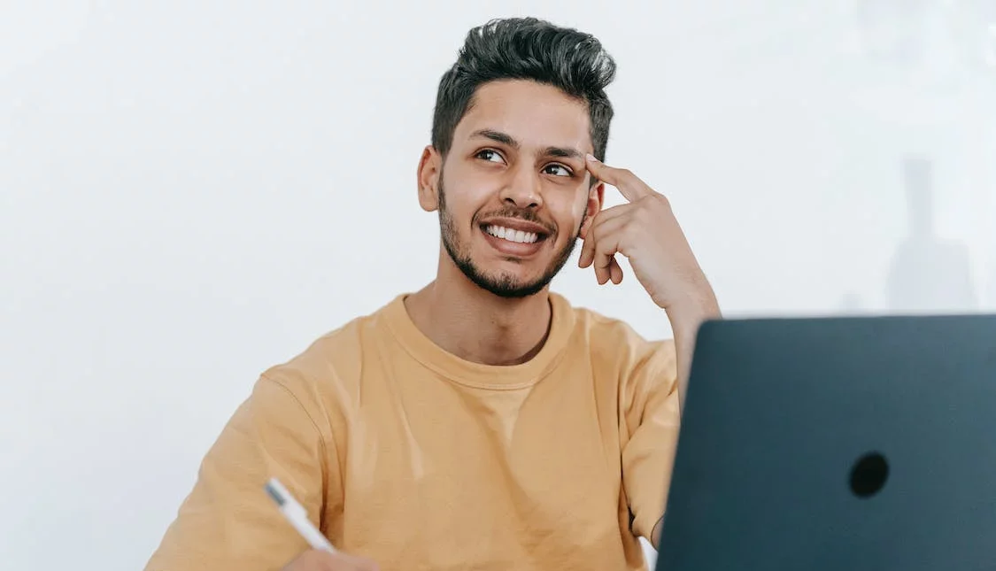 Young business man thinking about project