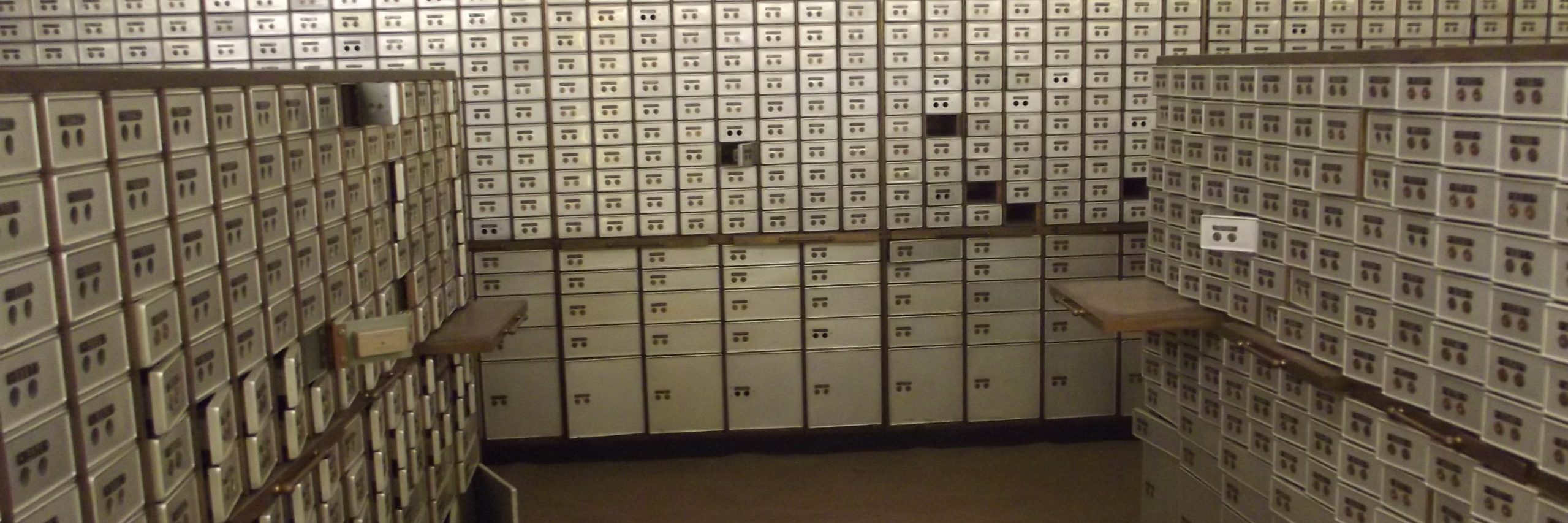 A bank vault with safety deposit boxes