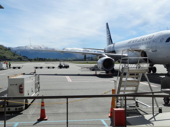 The airport tarmac with a Air New Zealand aircraft at Queenstown Airport, New Zealand