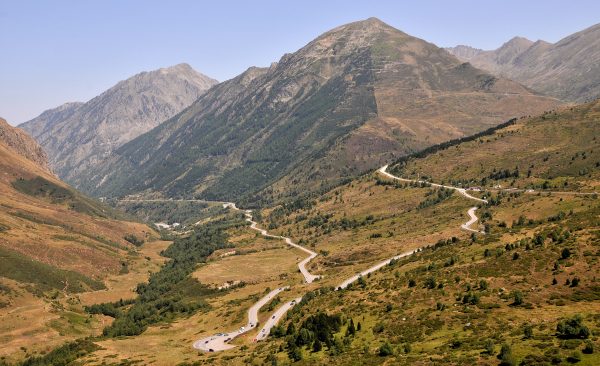 Pyrenees mountains range with a road through the middle