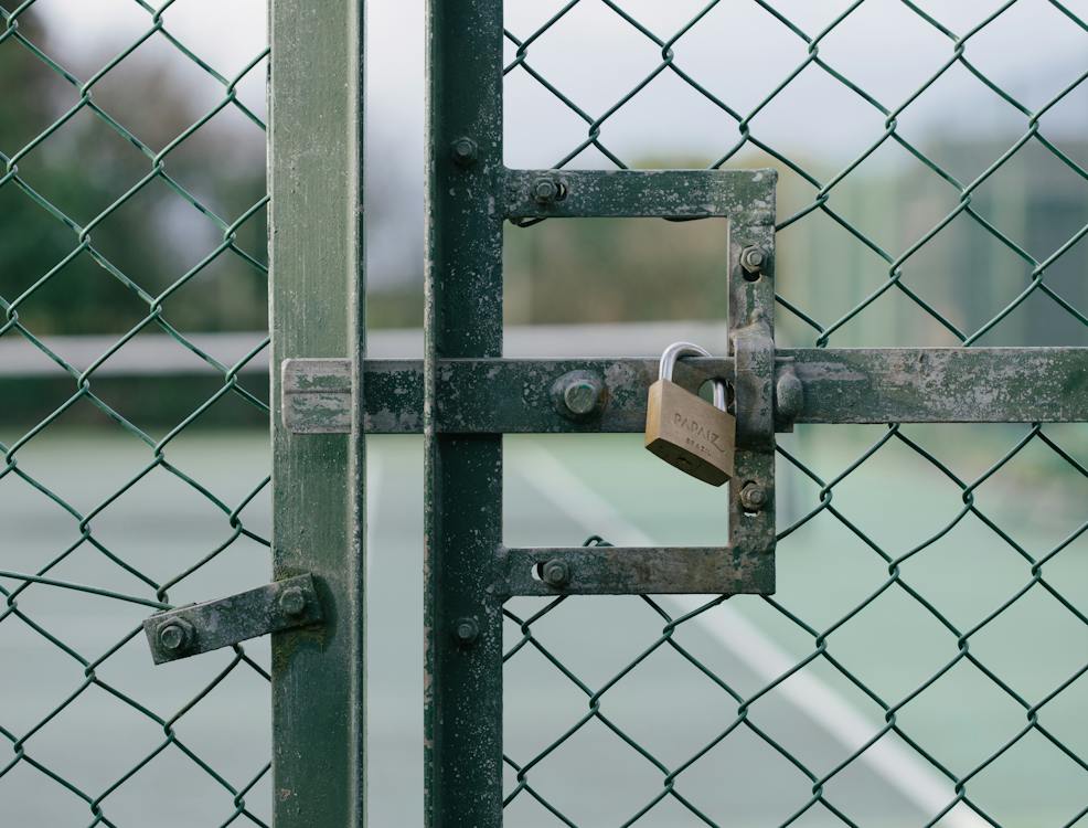 Padlock on Metal Gate