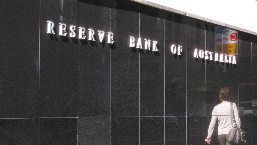 Person walking by Reserve Bank of Australia