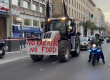 Truck on road with banner protesting