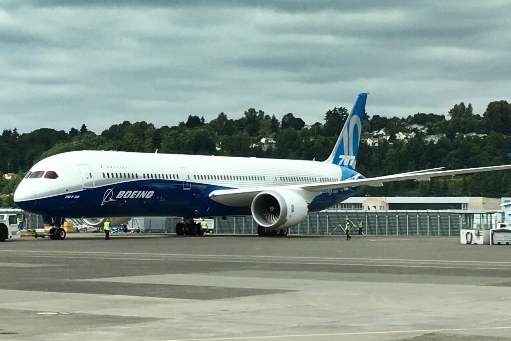 a boeing aircraft sitting on a runway