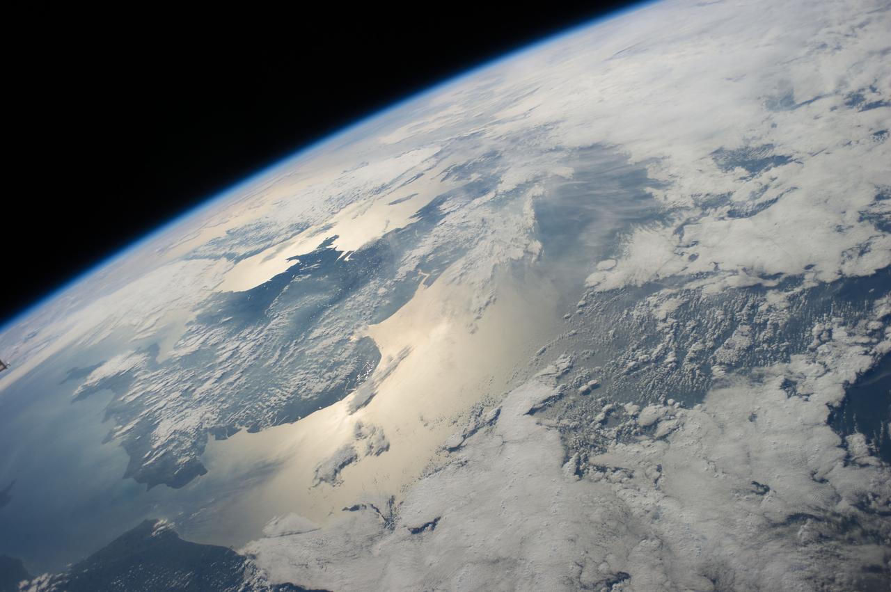 The curvature of the earth observed from space. Image source: Reid Wiseman, via NASA