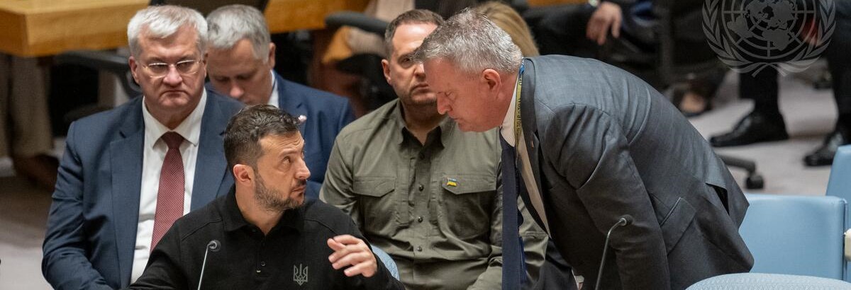 Ukranian President Volodymyr Zelenskyy (seated) with Sergiy Kyslytsya (standing), Ukraine's Permanent Representative to the UN during a Security Council meeting on Ukraine. Photo: United Nations