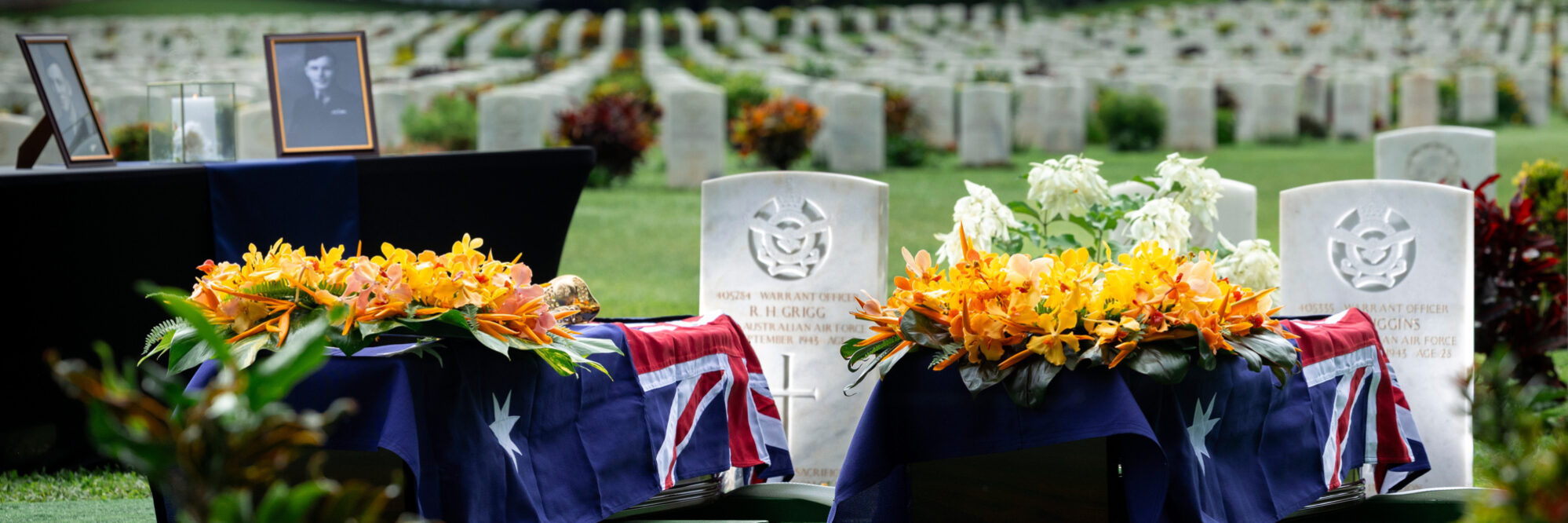 The caskets of warrant officers Russell Grigg and Clement Wiggins ready to be lowered at the Bomana War Cemetery, Port Moresby, PNG. Photo: Department of Defence