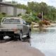 Flooding in Ingham in 2018. The driver stopped and reversed direction when he came across the flooding. Photo: ANDREW KACIMAIWAI
