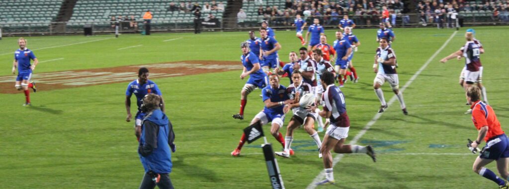 File photo … Auckland’s Blues (chequered jerseys) take on France at Horth Harbour Stadium, Auckland. Photo courtesy ANDREW KACIMAIWAI