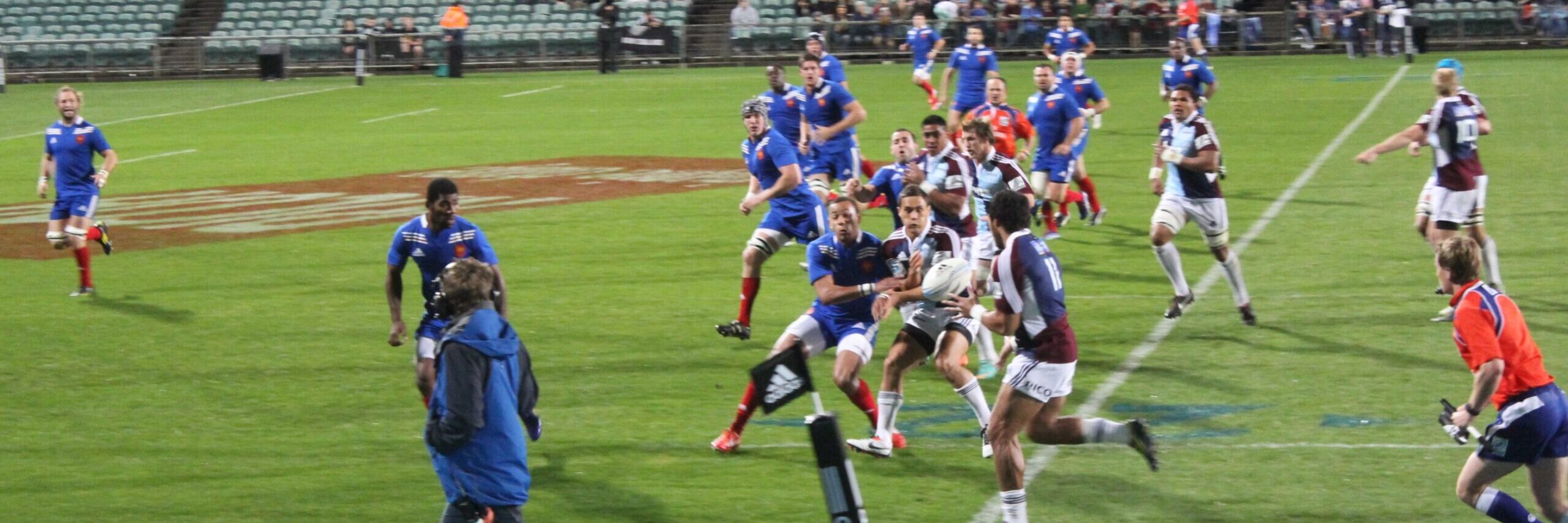 File photo … Auckland’s Blues (chequered jerseys) take on France at Horth Harbour Stadium, Auckland. Photo courtesy ANDREW KACIMAIWAI