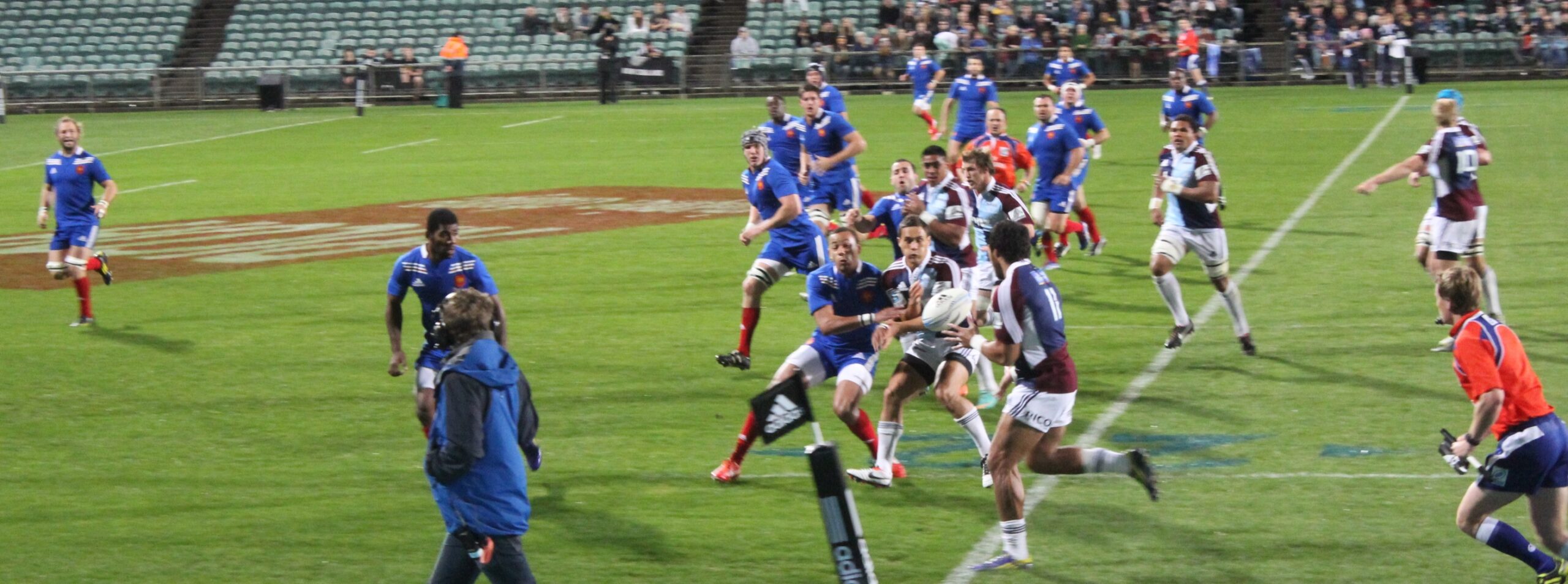 File photo … Auckland’s Blues (chequered jerseys) take on France at Horth Harbour Stadium, Auckland. Photo courtesy ANDREW KACIMAIWAI