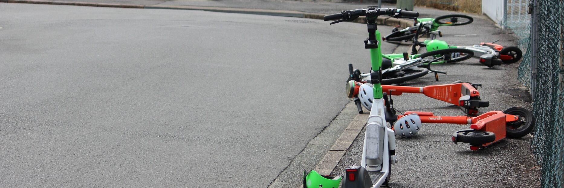 E-scooters net to a rail station in suburban Brisbane, Queensland. Photo: ANDREW KACIMAIWAI