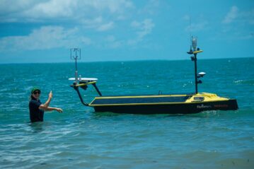 Dr Ruth Patterson with the USV Monica, part of the SUN Fleet. Photo: supplied