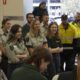 Victorian firefighters are briefed ahead of their departure to Canada via Brisbane. Photo: Vic Emergency