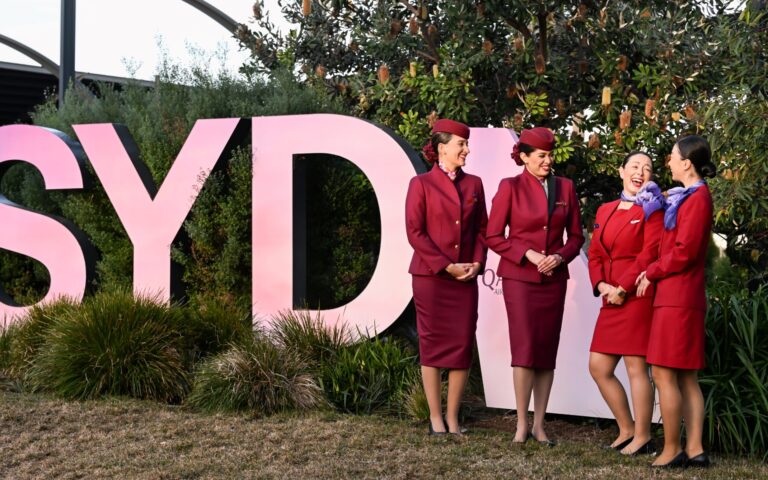 Virgin Australia and Qatar Airways cabin crew at the launch of the Doha service on June 12, 2025. Photo: James Morgan/Getty (supplied)