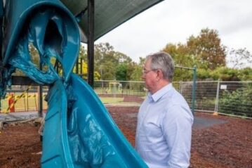 Mayor Peter Flannery at the scene of the vandalised playground. Photo: Moreton Bay Regional Council