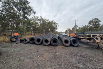 The recovered 200+ tyres whose presence delayed controlled burn. Photo: Qld Environment Department.