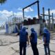 FILE …. an IAEA team at a damaged electrical sub-station in Enerhodar in June last year . Photo: IAEA
