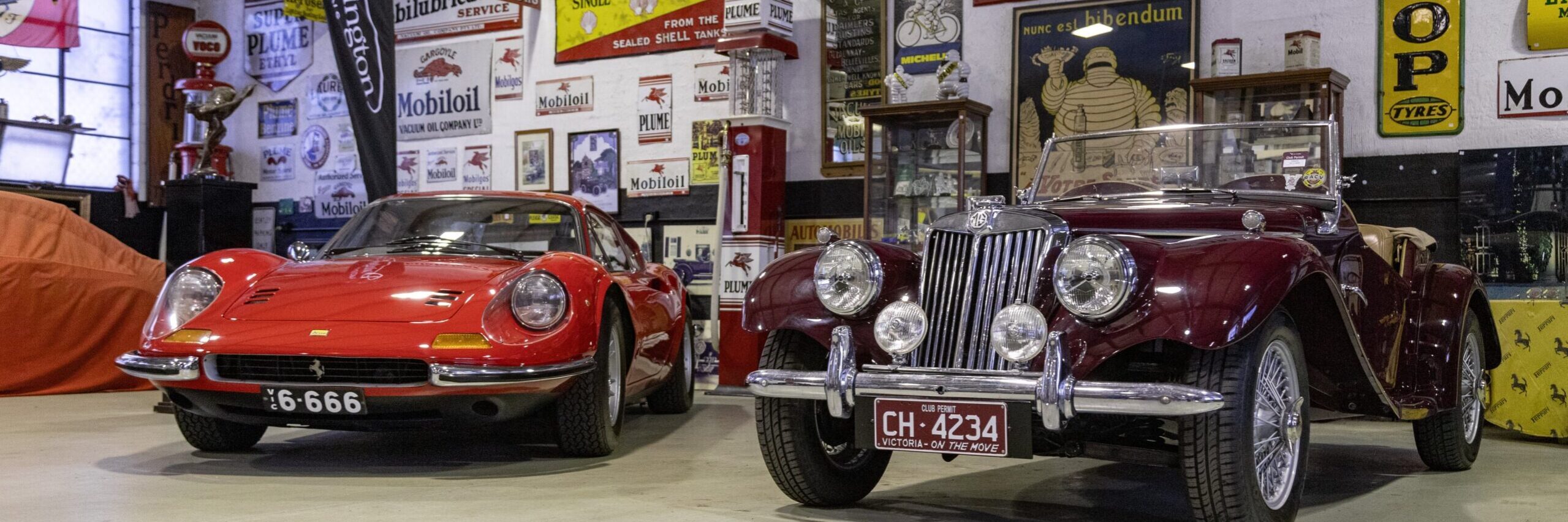 The plate on the Ferrari Dino, which were sold separately, and the 1955 MG TF 1500 roadster. Photo: Donington Auctions