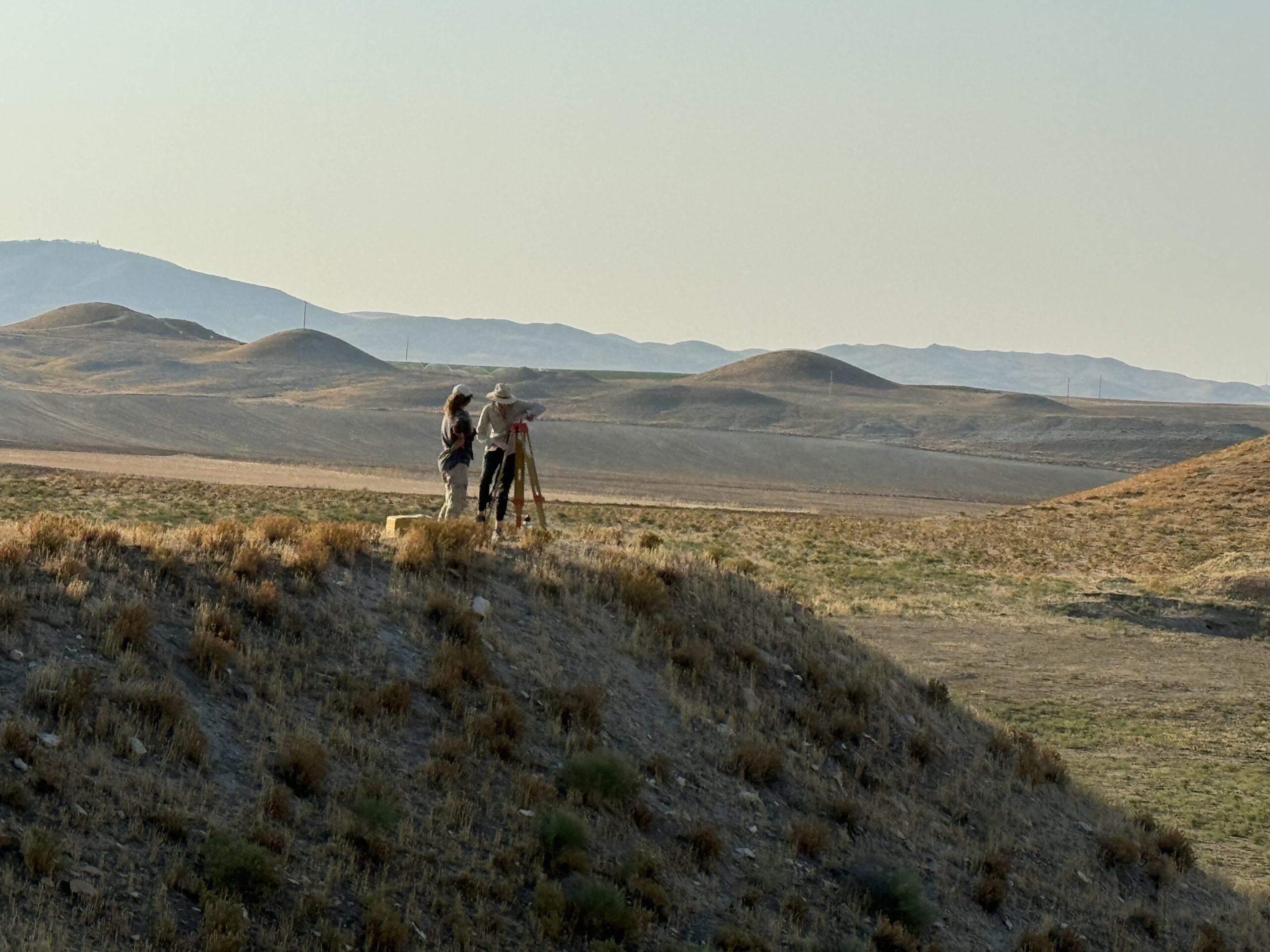 Researchers study mounds near the ancient citadel of Gordion, Turkey. Photo: Prof Brian Rose (Penn Museum)
