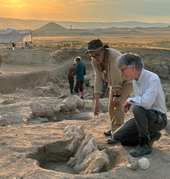 Excavating the South Gate cemetery. Front left is Gareth Darbyshire with Brian Rose at right. The mound believed to house the remains of King Midas's father is in the background (upper left). Photo: Gebhard Bieg