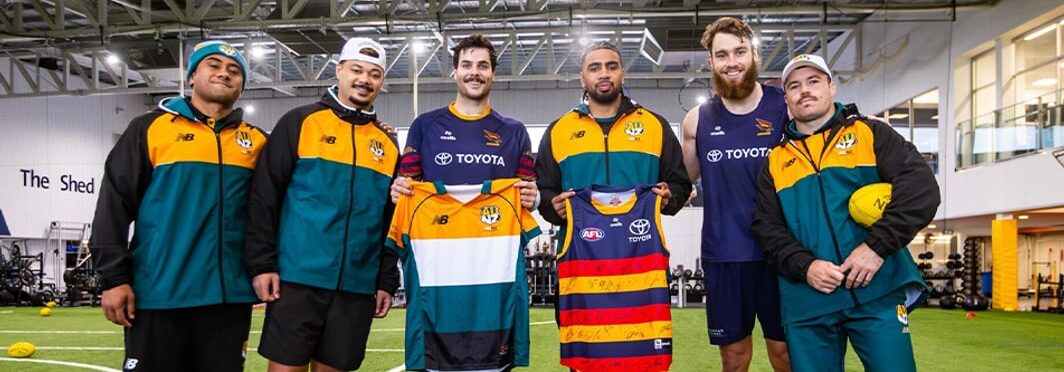 Kiwi players in a jersey swap at a Crows training session. Photo: ADELAIDE CROWS
