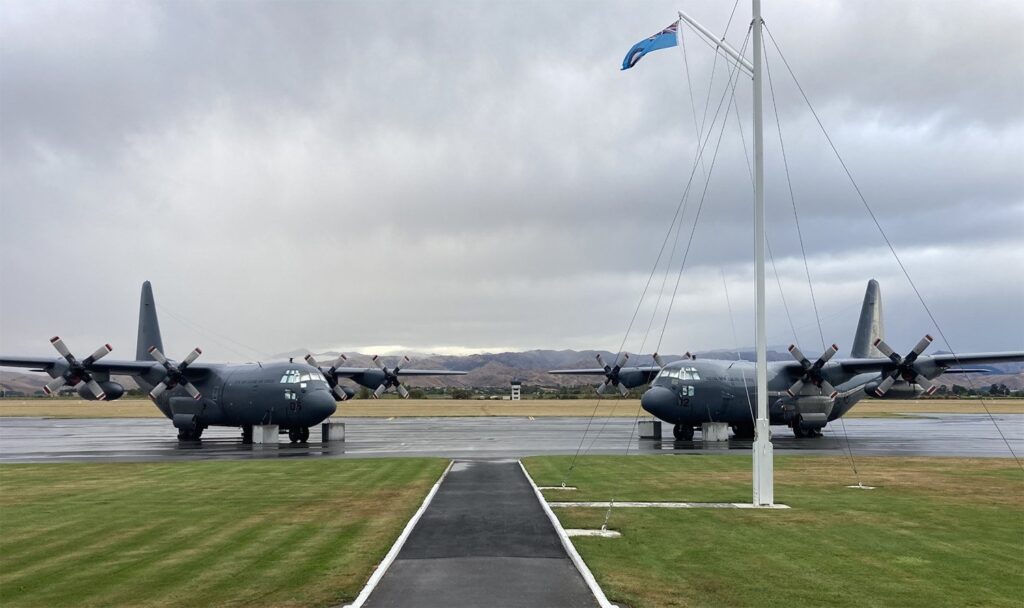 Two of the ex-RNZAF Hercules, now aerial firetankers, before their flight to the US. Photo: Coulson Aviation