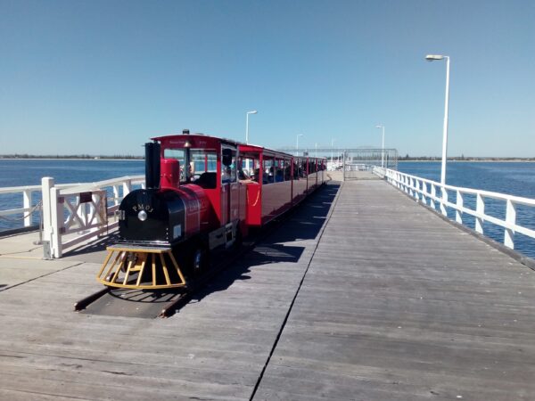 Perth WA rents ... FILE: Catching a train on the 1.8km-long Busselton Jetty. Photo: ANDREW KACIMAIWAI