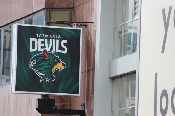 A sign for the new AFL team in Hobart CBD. Photo: ANDREW KACIMAIWAI