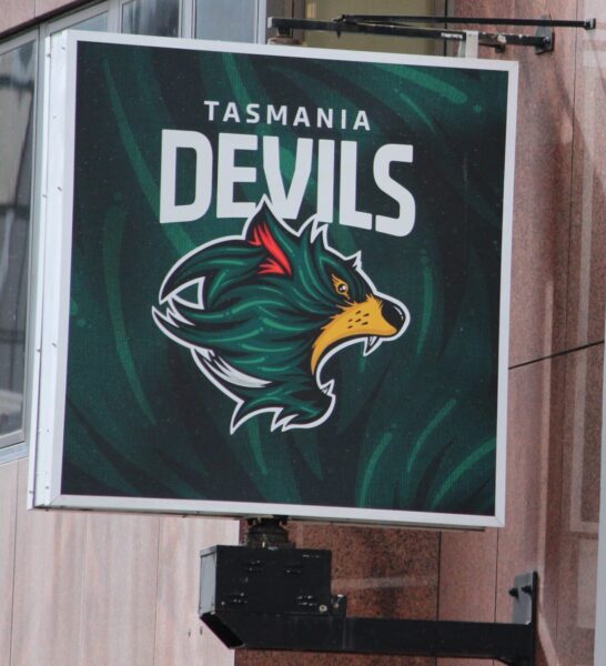 A sign for Tasmania Devils new AFL team in Hobart CBD. Photo: ANDREW KACIMAIWAI