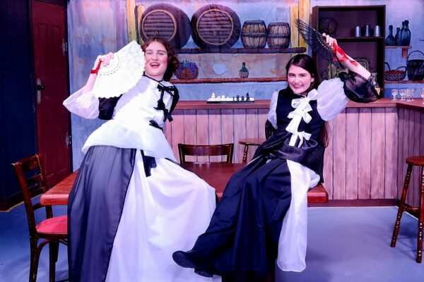 Mousetrap Theatre performers Liv Wood and Miranda Matthews during a dress rehearsal for their upcoming comedy Mirandolina. Photo: supplied/MBCC