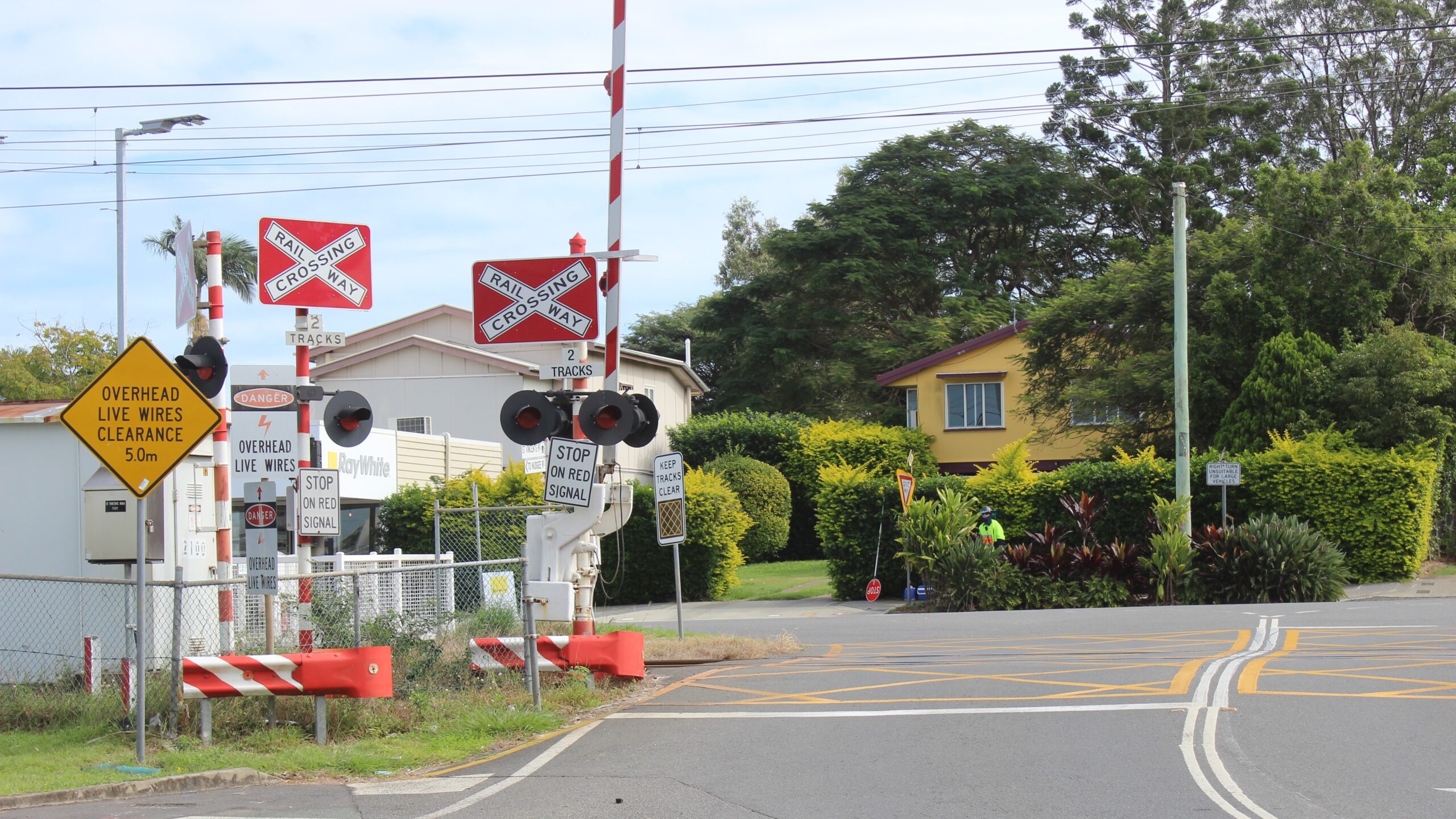 FILE … a suburban rail crossing in Brisbane. Photo: ANDREW KACIMAIWAI