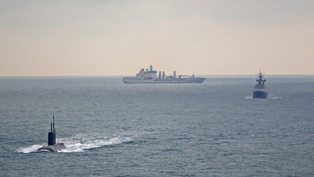 Oil tanker ... A Royal Navy tanker (background) monitors a Russian submarine and its tugboat heading west through the Dover Straits last month. Photo: UK MOD © Crown copyright 2025