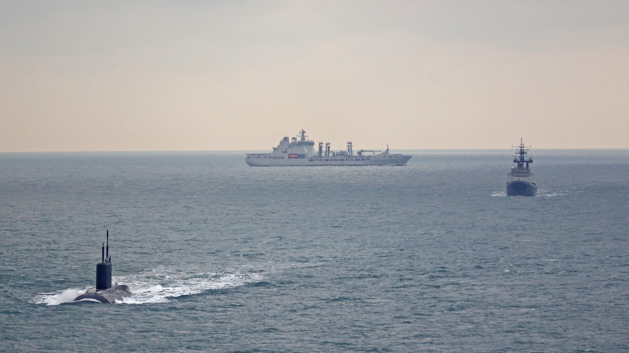 Oil tanker ... A Royal Navy tanker (background) monitors a Russian submarine and its tugboat heading west through the Dover Straits last month. Photo: UK MOD © Crown copyright 2025