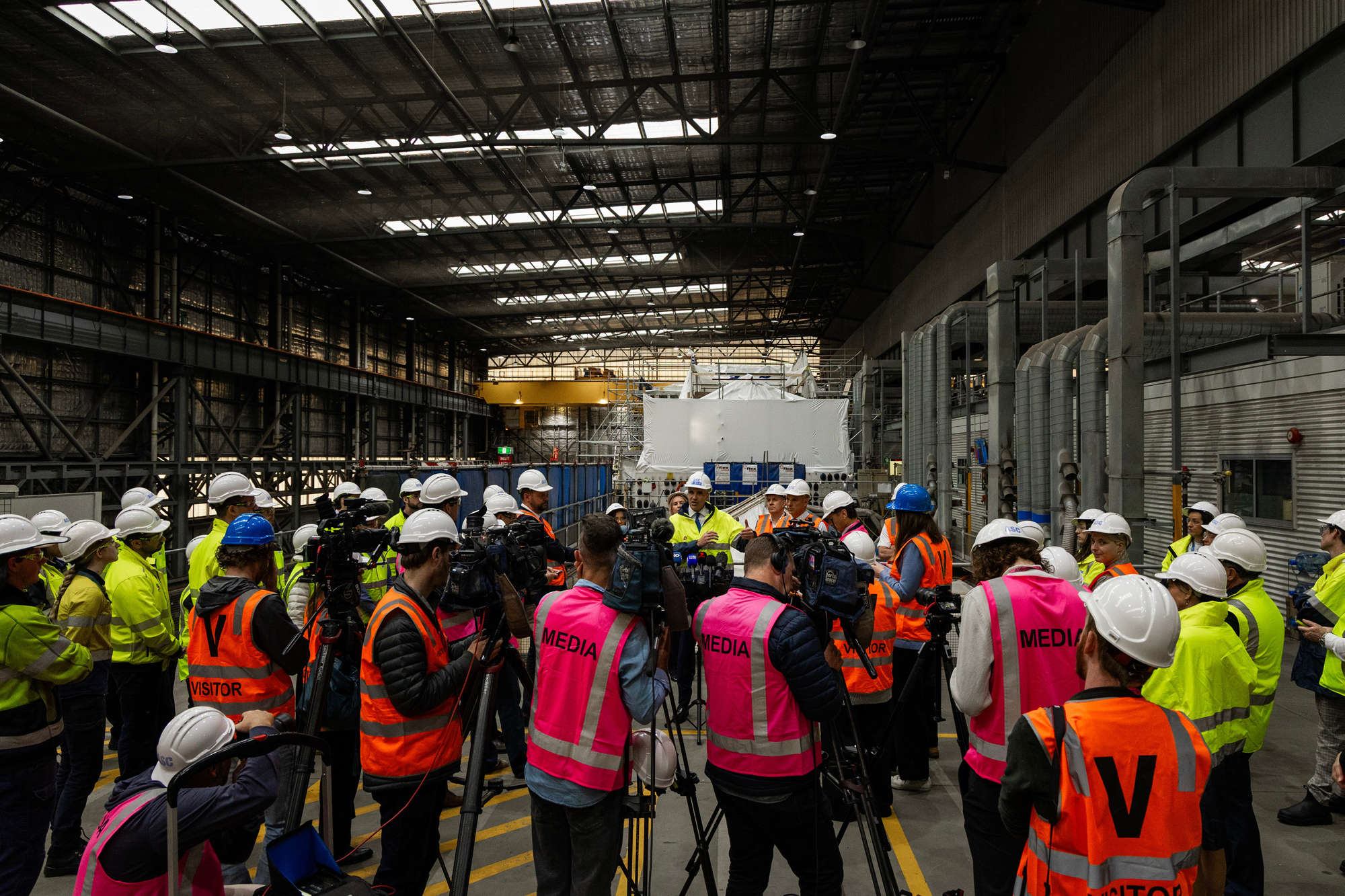 submarine FILE … SA Premier Peter Malinauskas talks to journalists inside the new training academy campus at Osborne in late 2025. Photo: Department of Defence