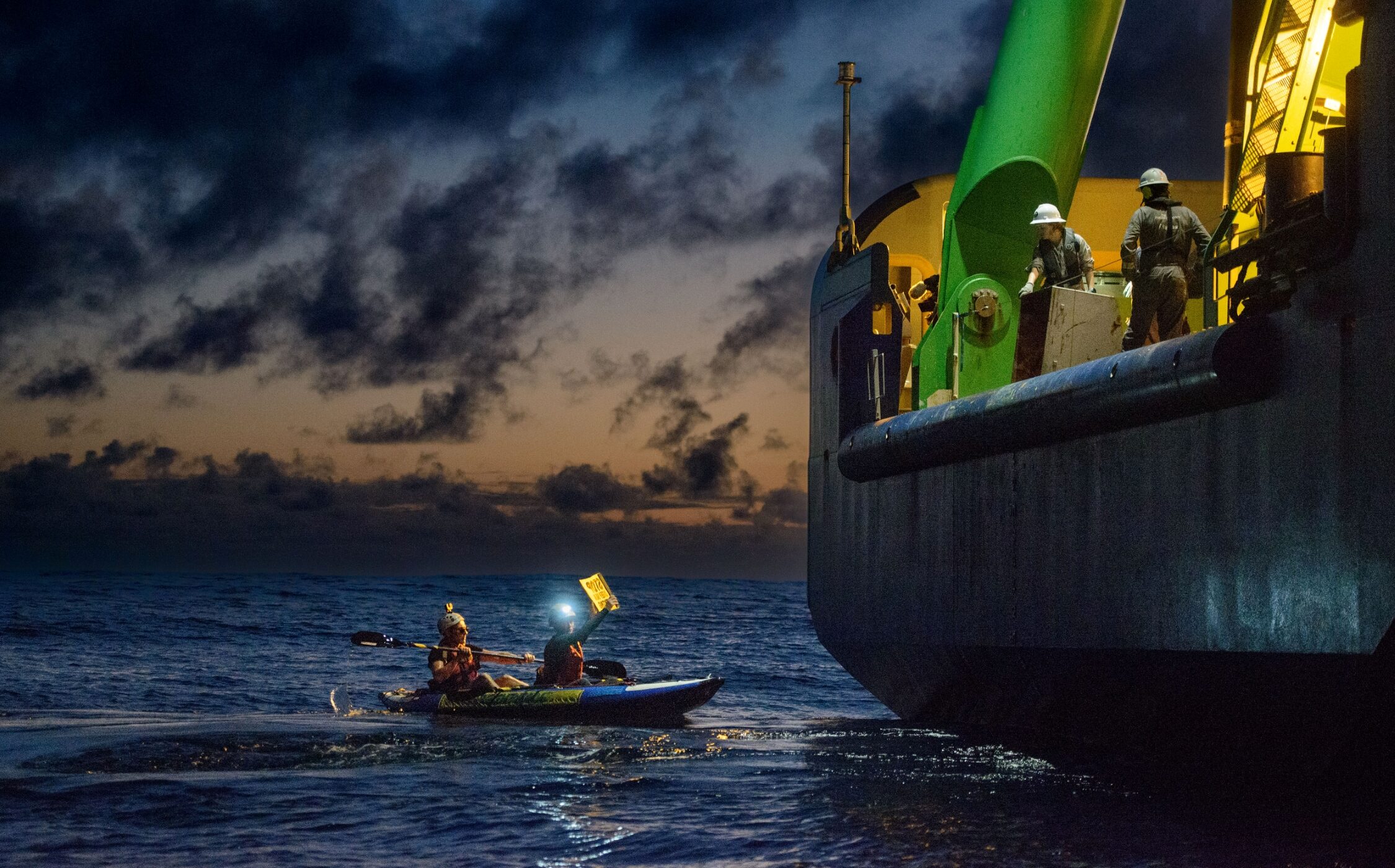 A maritime protest around the MV Coco in late 2023 in the Pacific. The Coco is a specialised offshore drilling vessel collecting data for deep sea miners. Photo: Martin Katz/Greenpeace