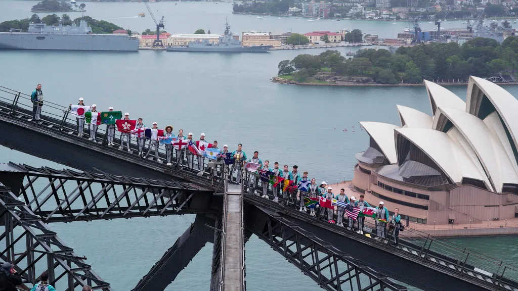 Former and current Wallabies with young people representing the 24 countries playing in the World Cup. Photo: WORLD RUGBY.