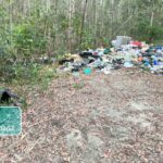 Dead cows, boats turning up in illegal dump sites across Moreton Bay: council